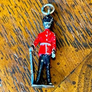 Sterling, and enameled palace guard charm
